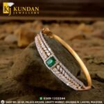 Gold Bracelet with Emerald Center