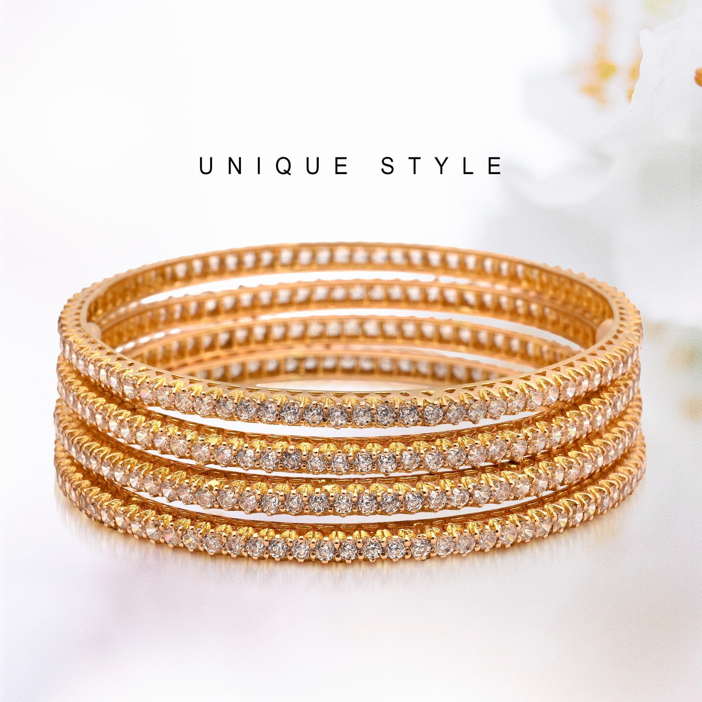 _kundan_jeweller_1666191737_2952552752353585723_54386949274 Diamond-Cut Gold Bangles Set with Sparkling Stone - Image 1